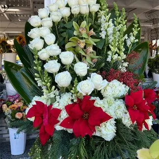 Poinsettia and White Rose Arrangement